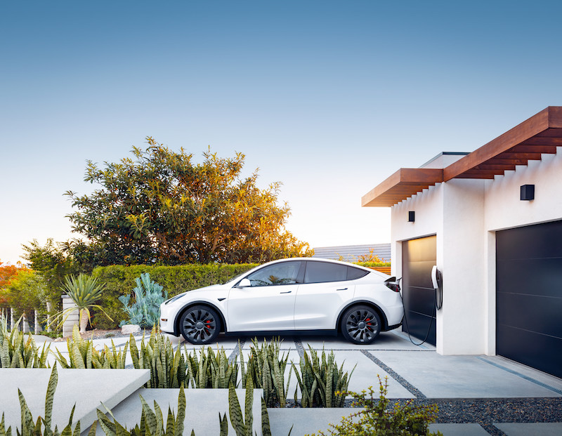 Tesla Model Y Charging on Exterior EV Charger