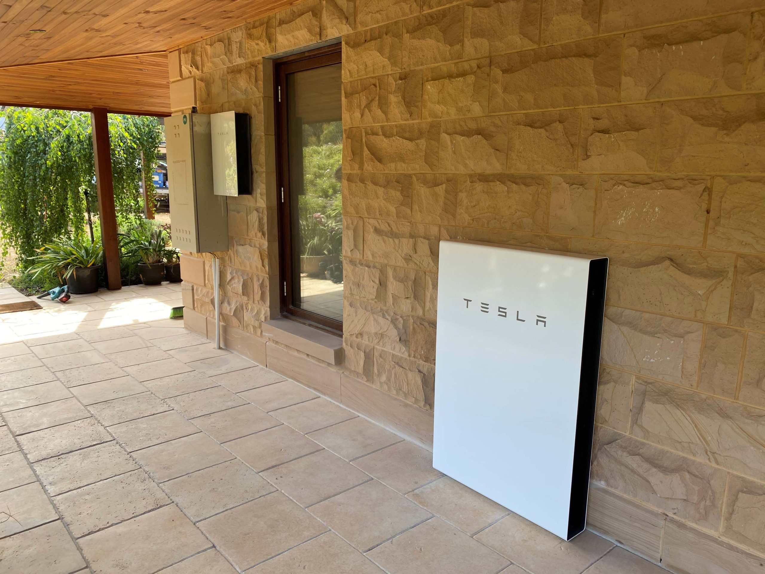 Tesla Powerwall Installed on Sandstone exterior